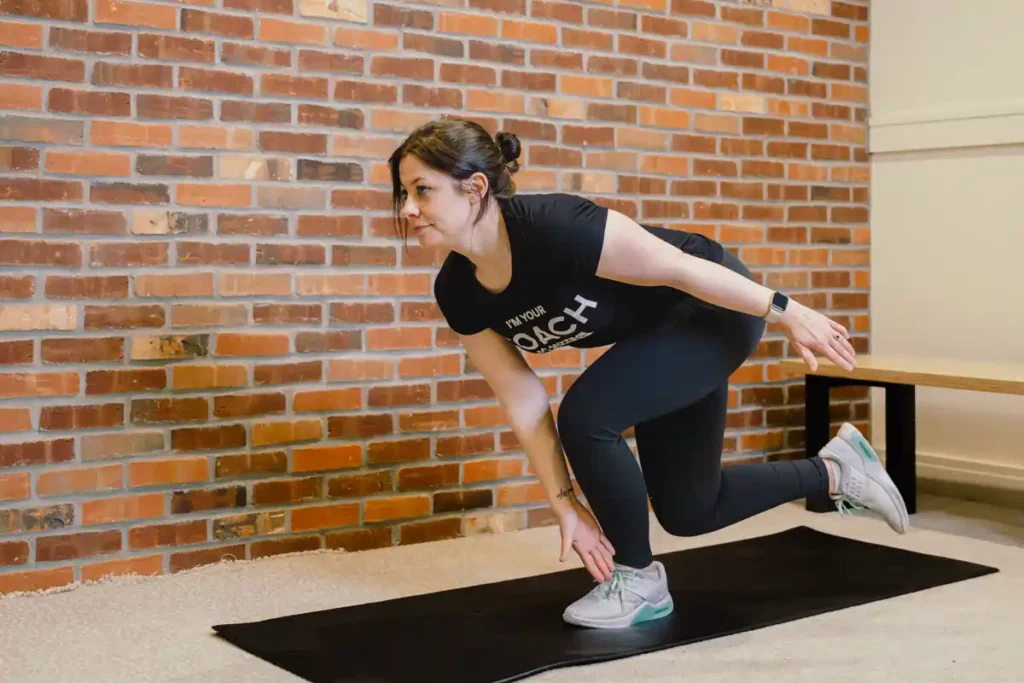 Tone Your Arms in Just One Week: Achieve Results Without the Gym! 1 A person exercising their arms at home with light weights Birch