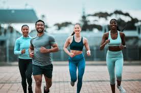 Sculpting Sleek Arms: The Essential Role of Cardio in Toning Without Bulking Up 3 image of people running to incorporate cardio Birch exercise into their life to help tone arms and body.
